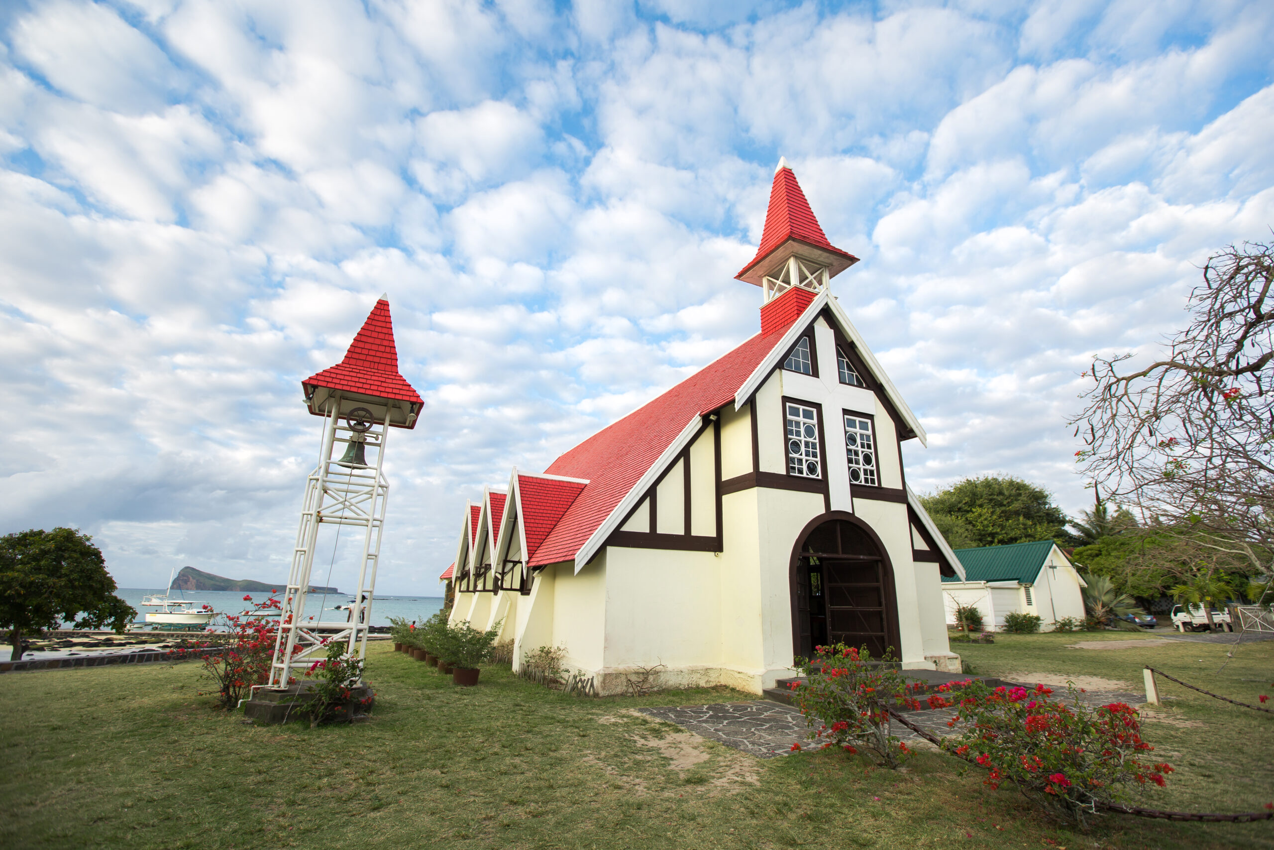 Notre Dame Auxiliatrice Church with distinctive red roof at Cap Malheureux, Mauritius, Indian Ocean